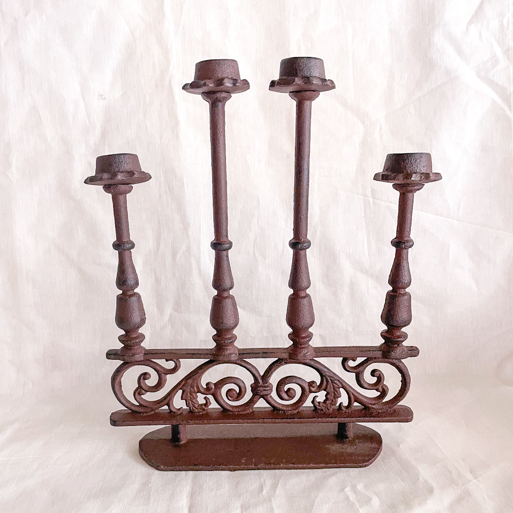 Antique iron ornate candle holder