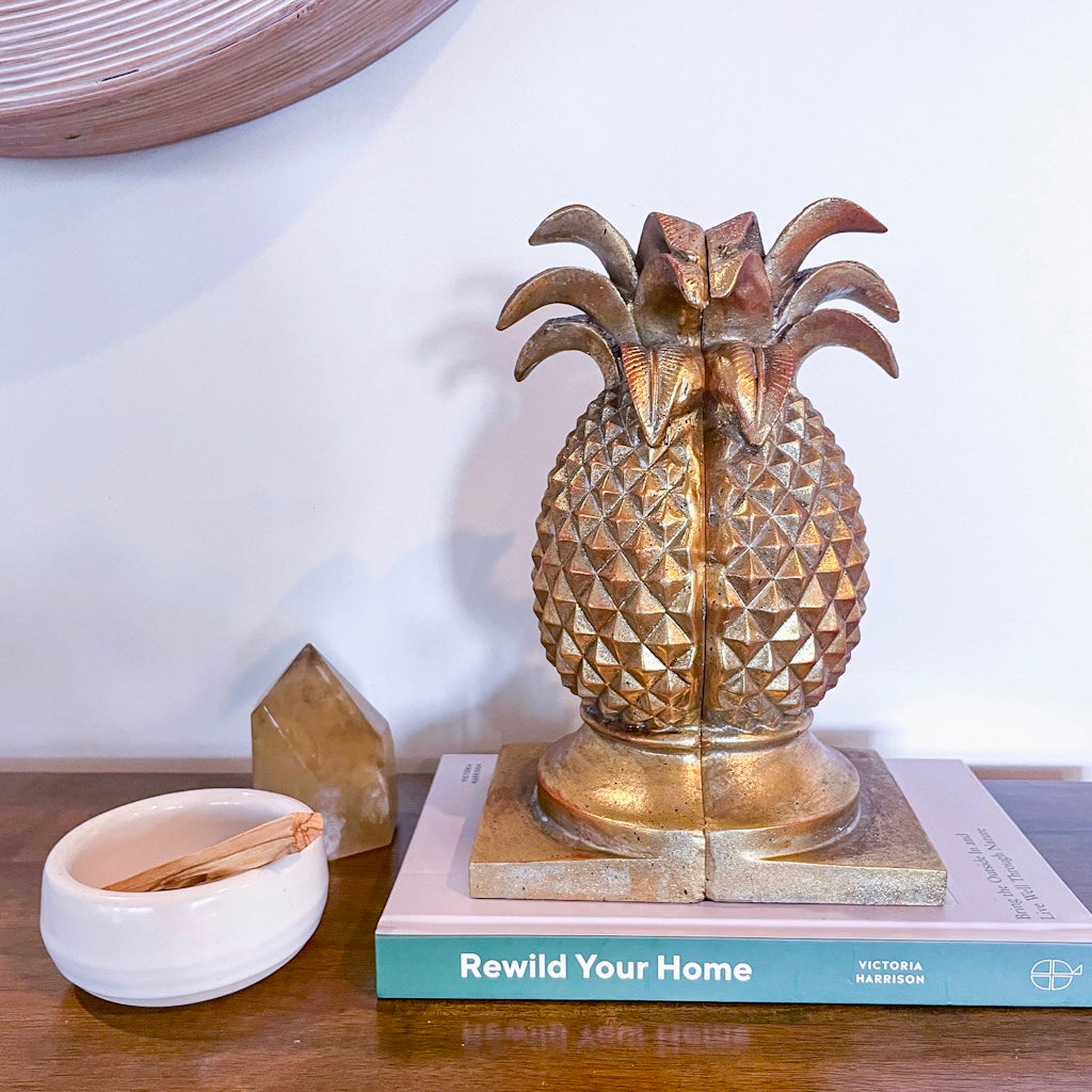 Golden pineapple bookend pair