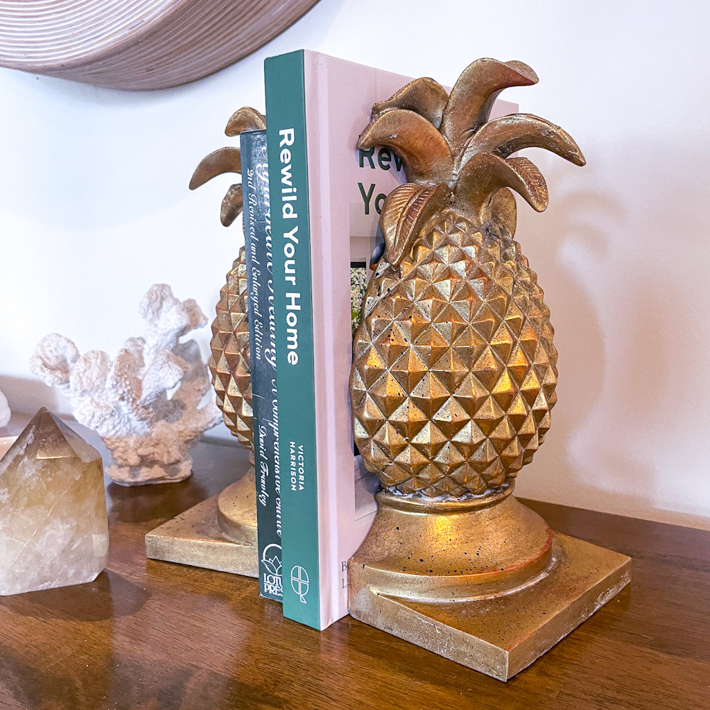 Golden pineapple bookend pair