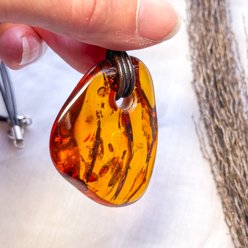 Baltic Amber crystal pendant necklace with inclusions