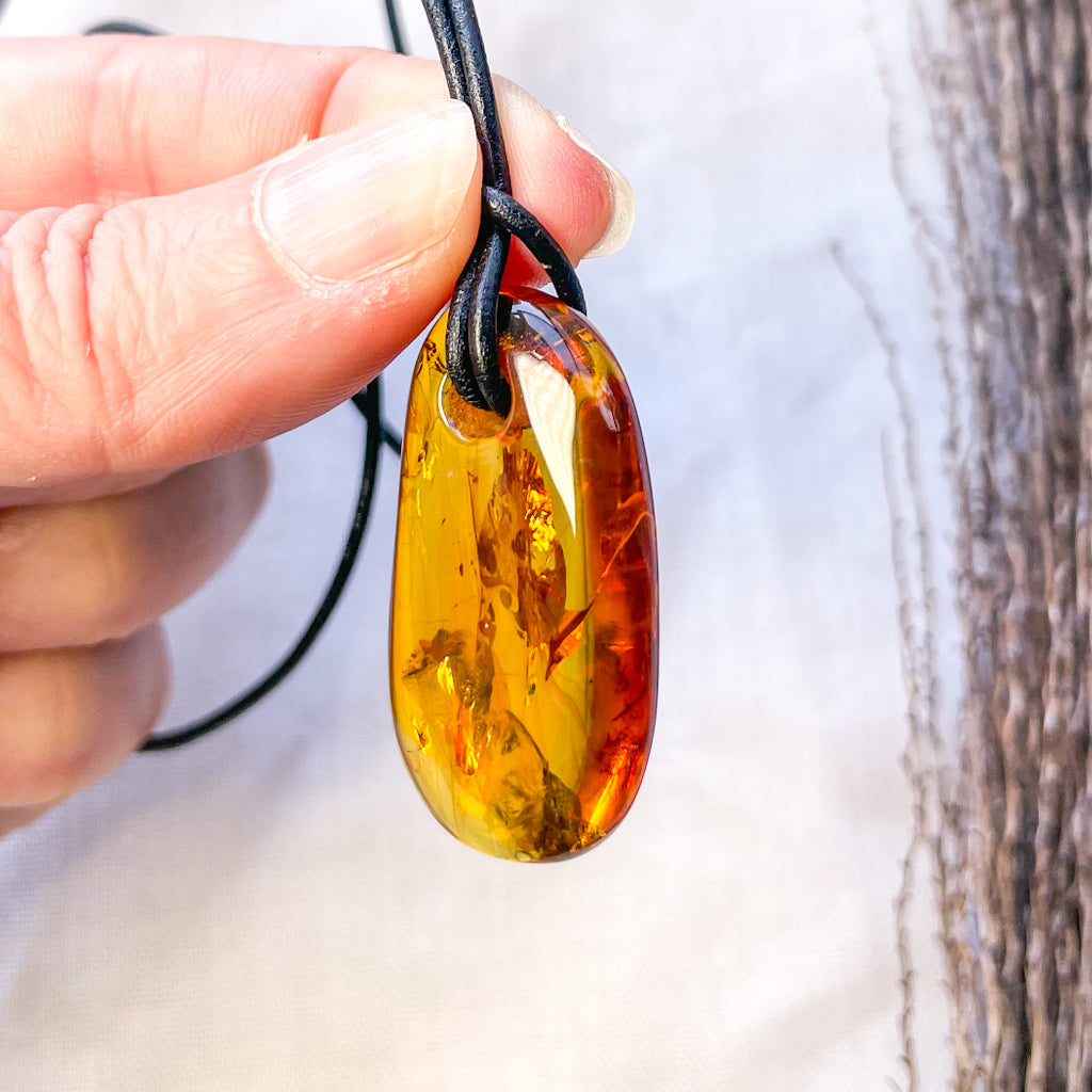 Baltic Amber crystal pendant necklace with inclusions
