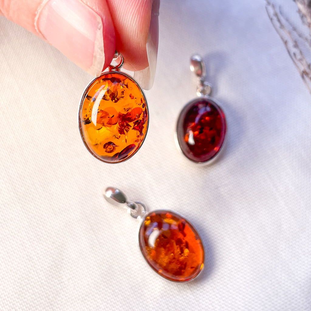 Baltic Amber crystal sterling silver pendant with inclusions
