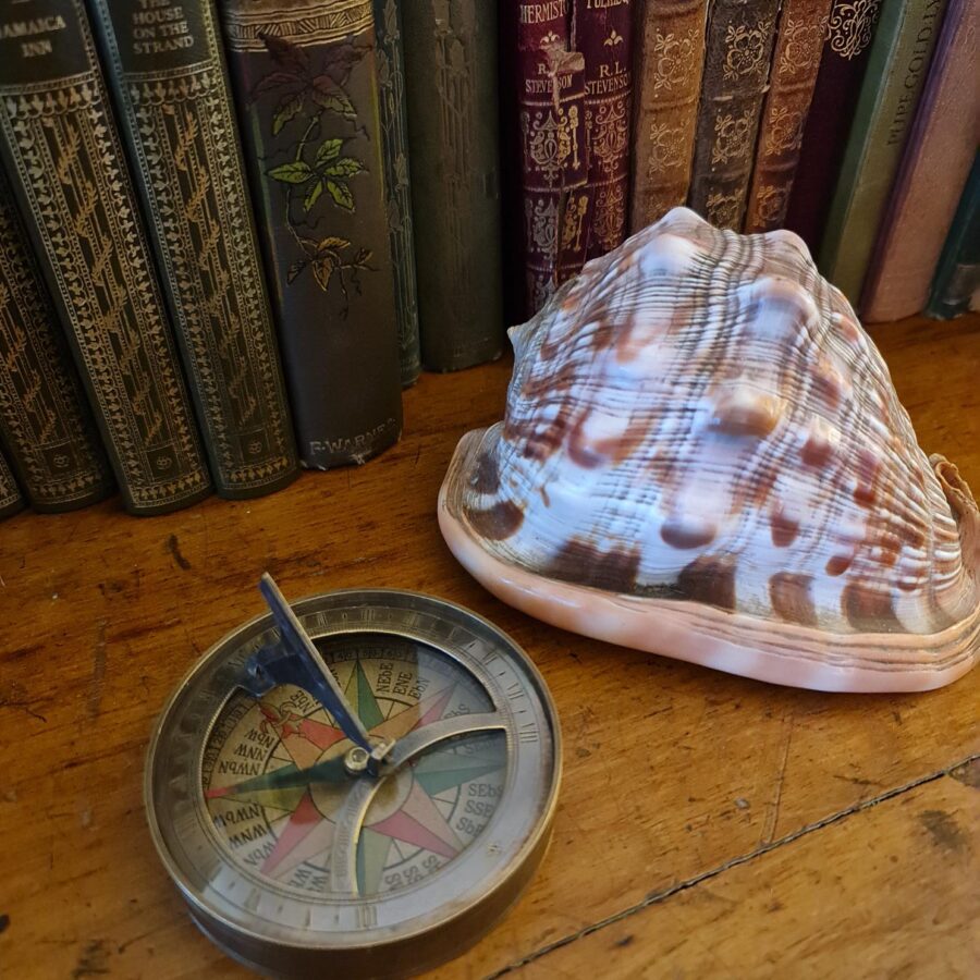 Antique bronze sundial and compass