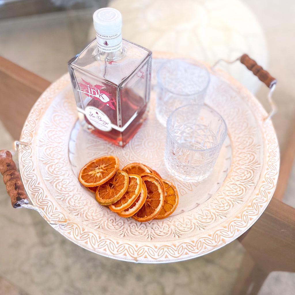 Pressed metal white washed brass tea tray with wooden handles
