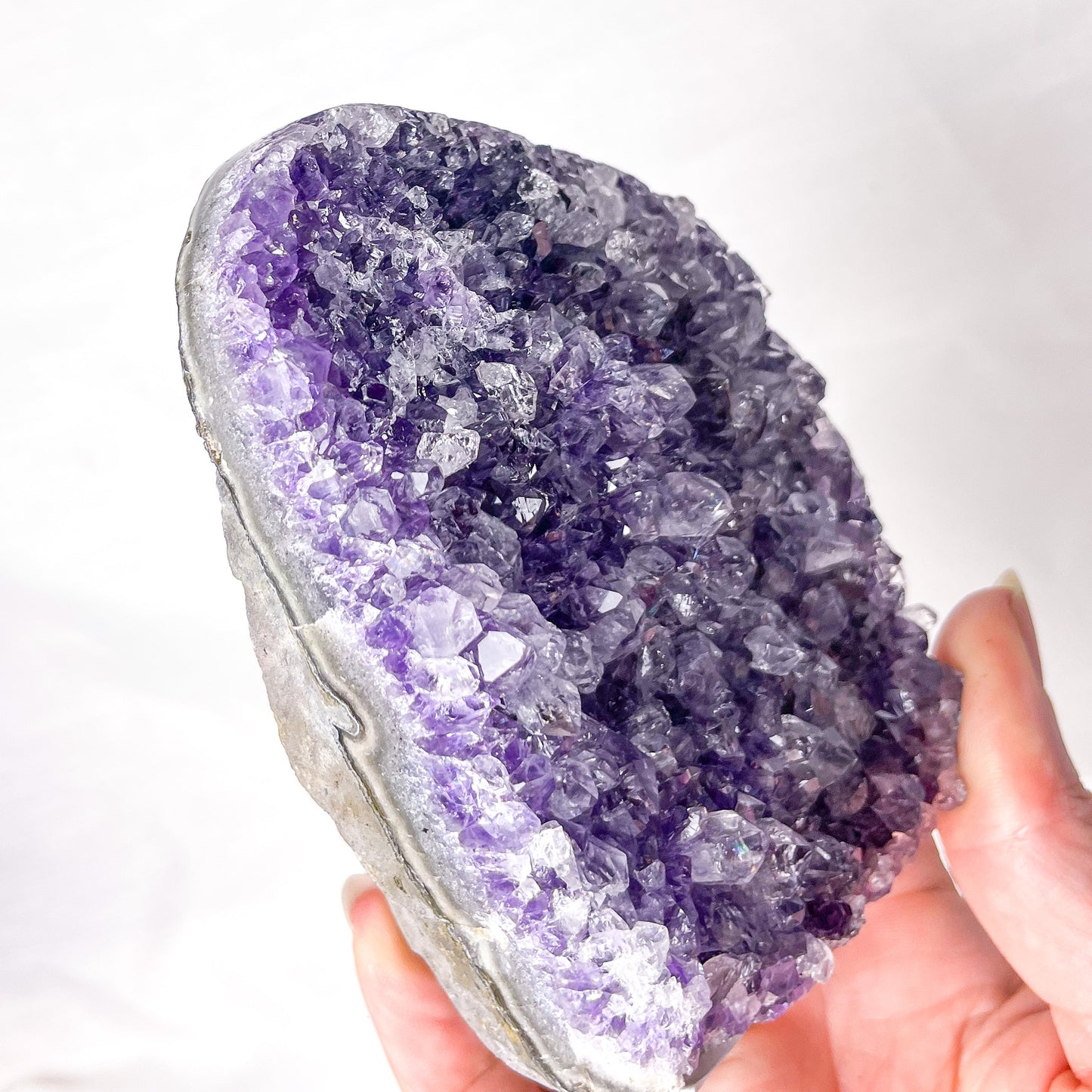 Amethyst crystal polished edge cluster 430g