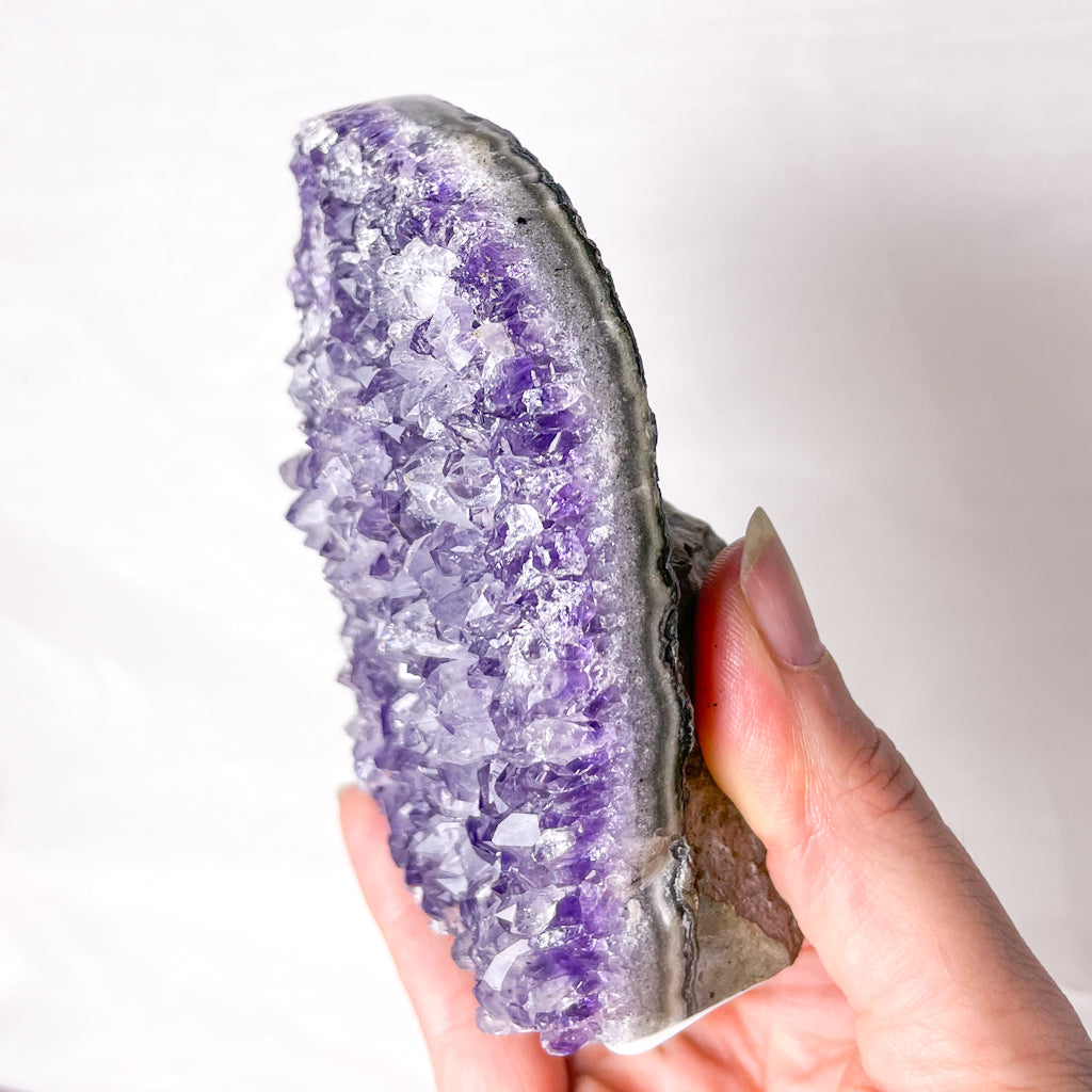 Amethyst crystal polished edge cluster 430g