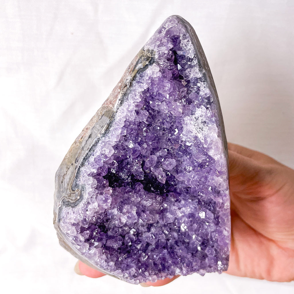 Amethyst crystal polished edge cluster 470g