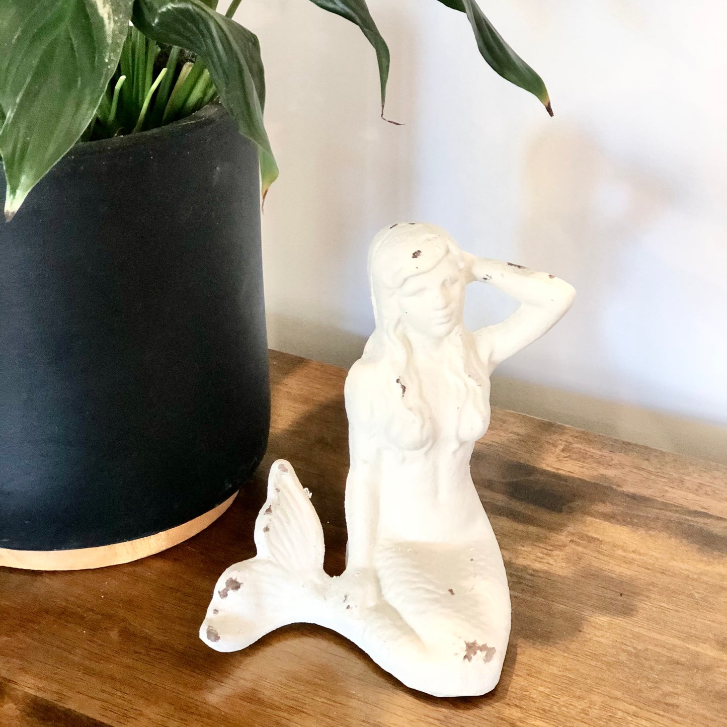 Mermaid cast iron statue