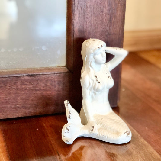 Mermaid cast iron statue