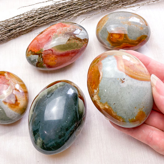 Polychrome jasper crystal palm stone large