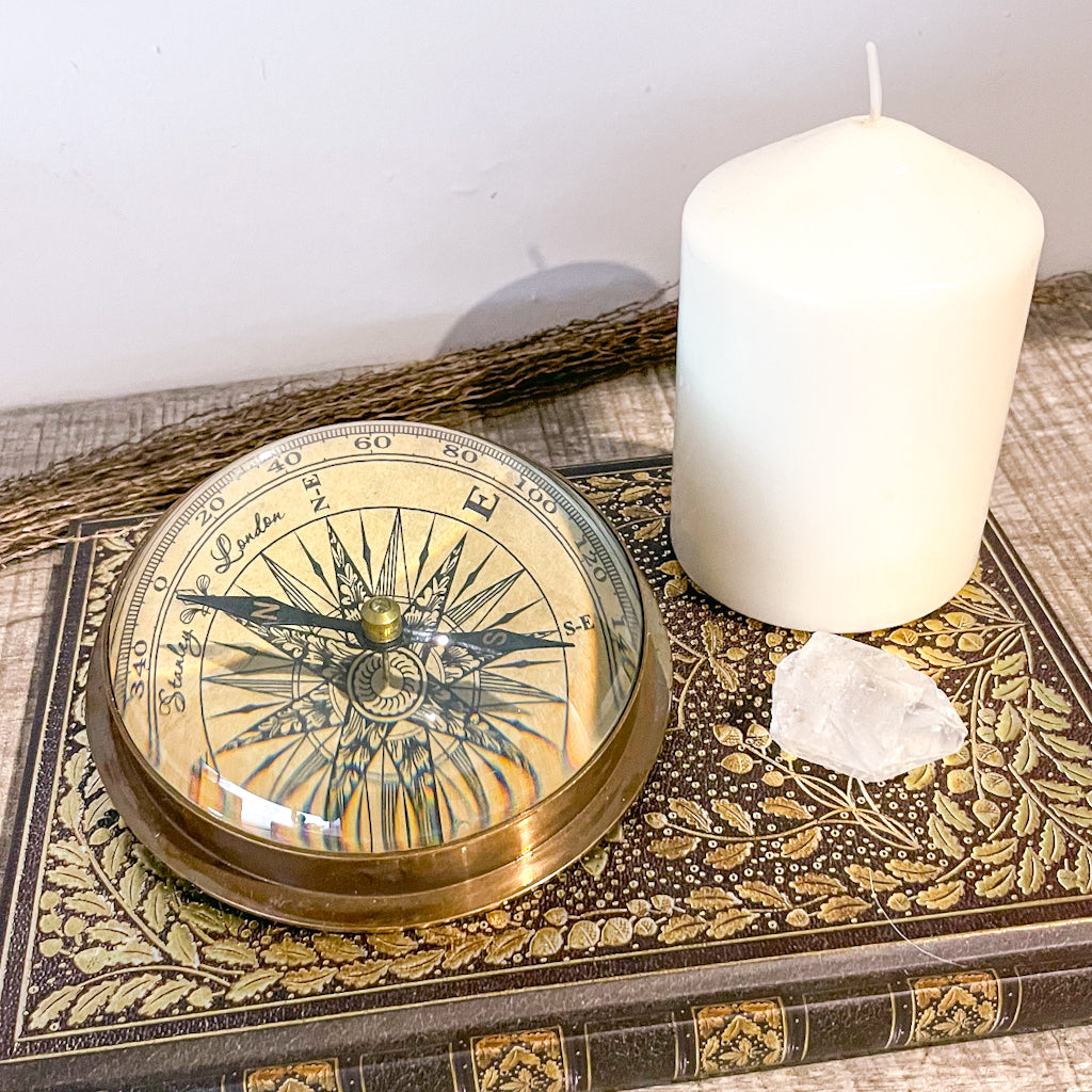 Antique brass compass paperweight