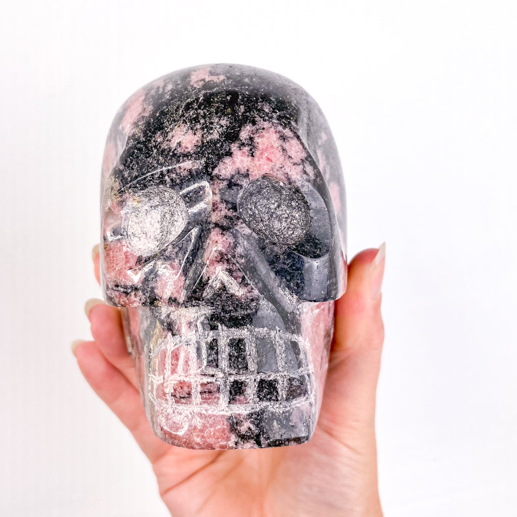 Rhodonite polished crystal skull XL 1.6kg