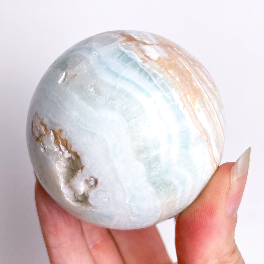 Caribbean Calcite crystal sphere 300g