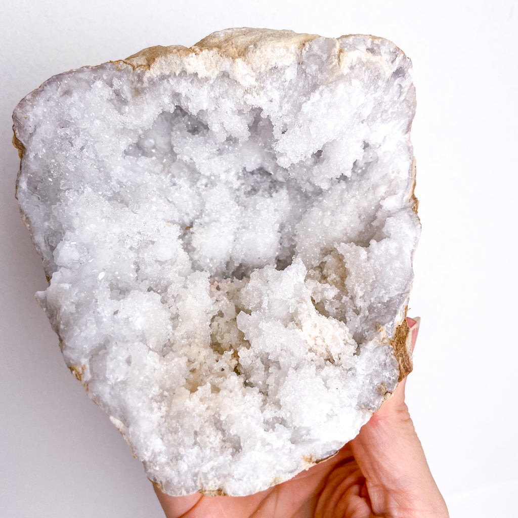 Clear quartz crystal geode cave pair L4