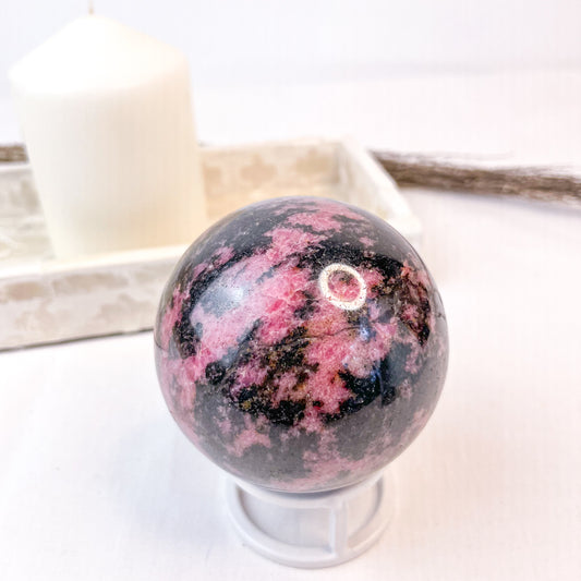 Rhodonite polished crystal sphere