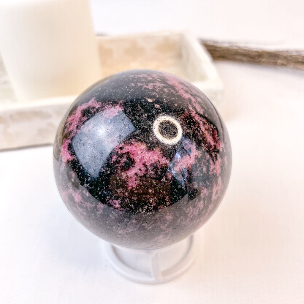 Rhodonite polished crystal sphere