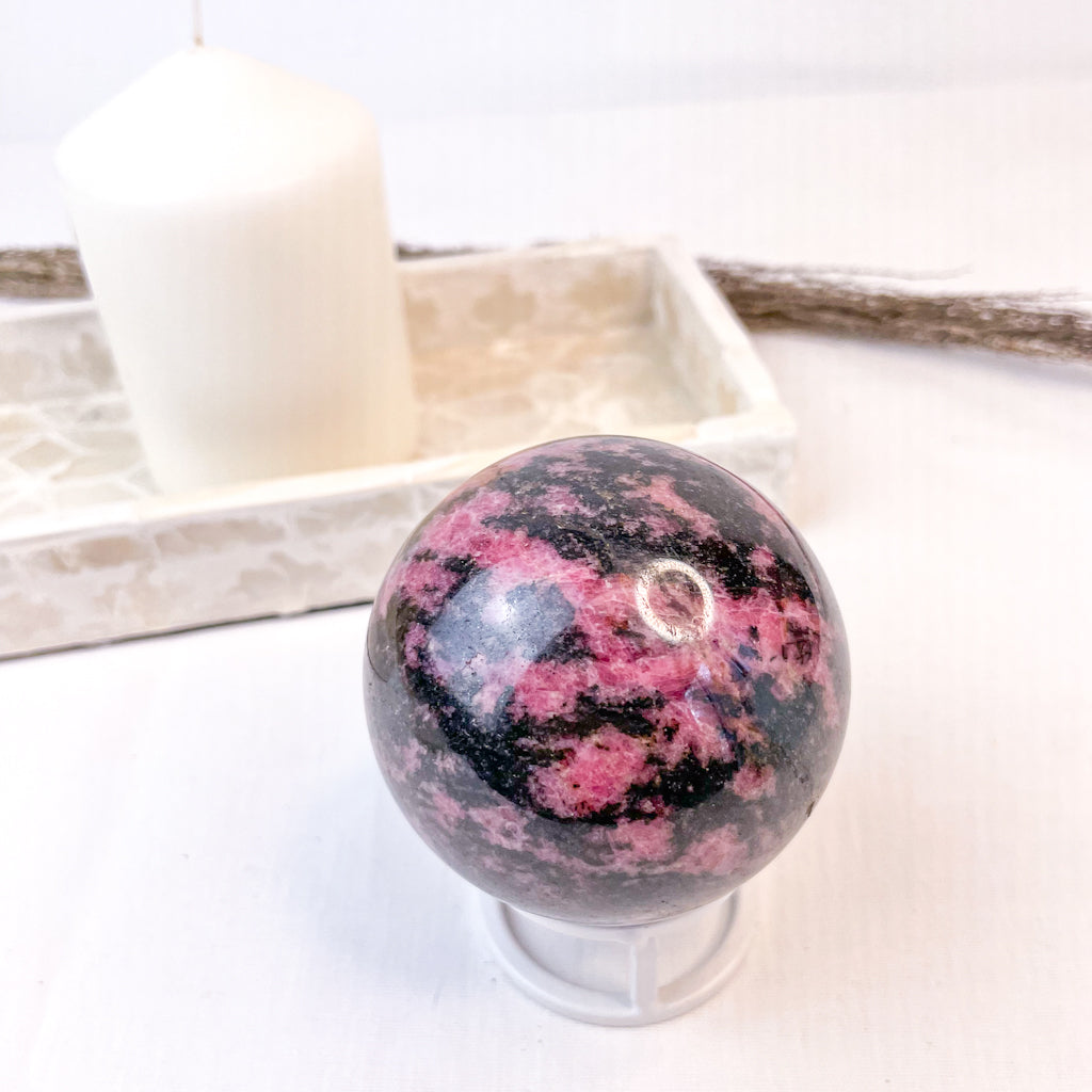Rhodonite polished crystal sphere