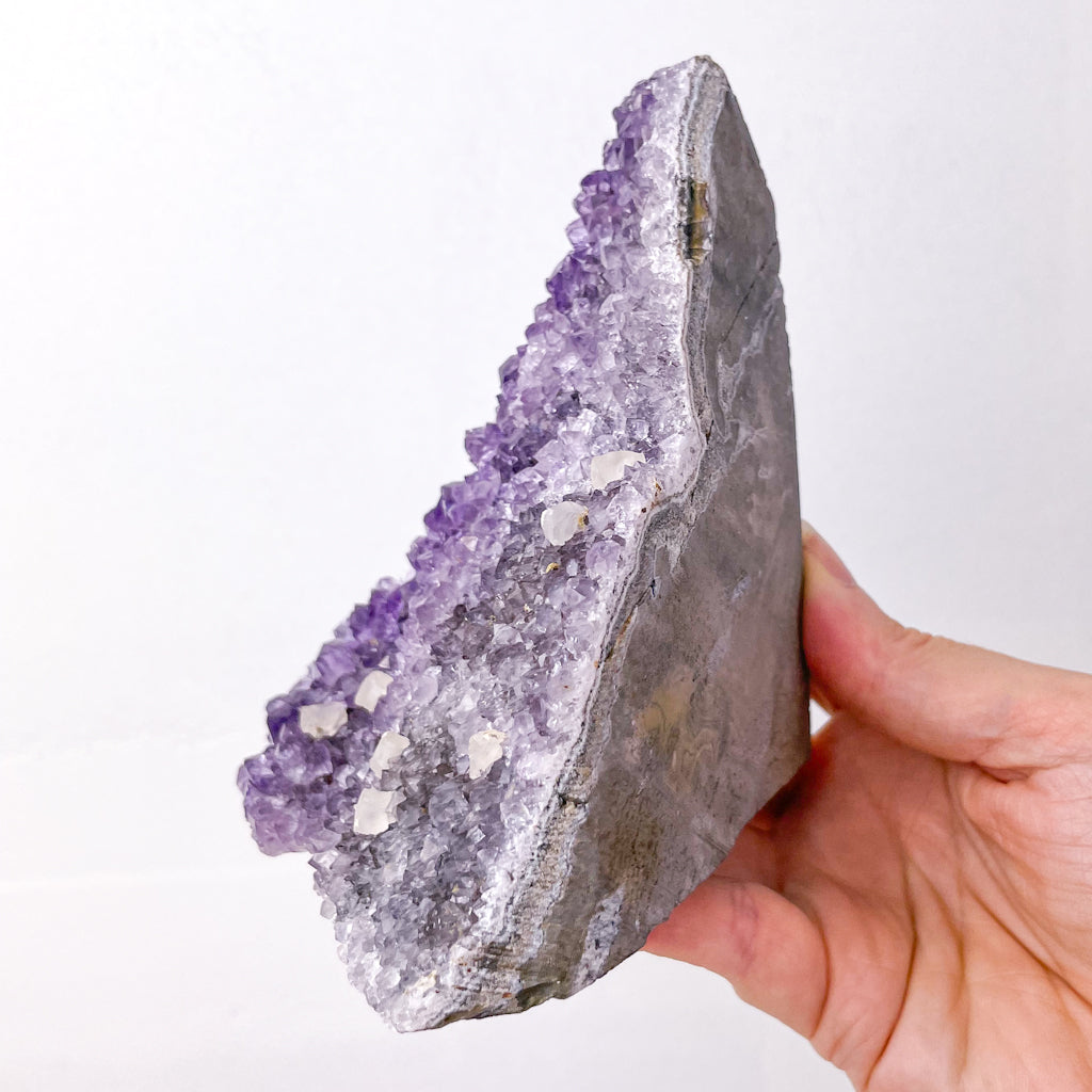 Amethyst + Calcite crystal flat base cluster