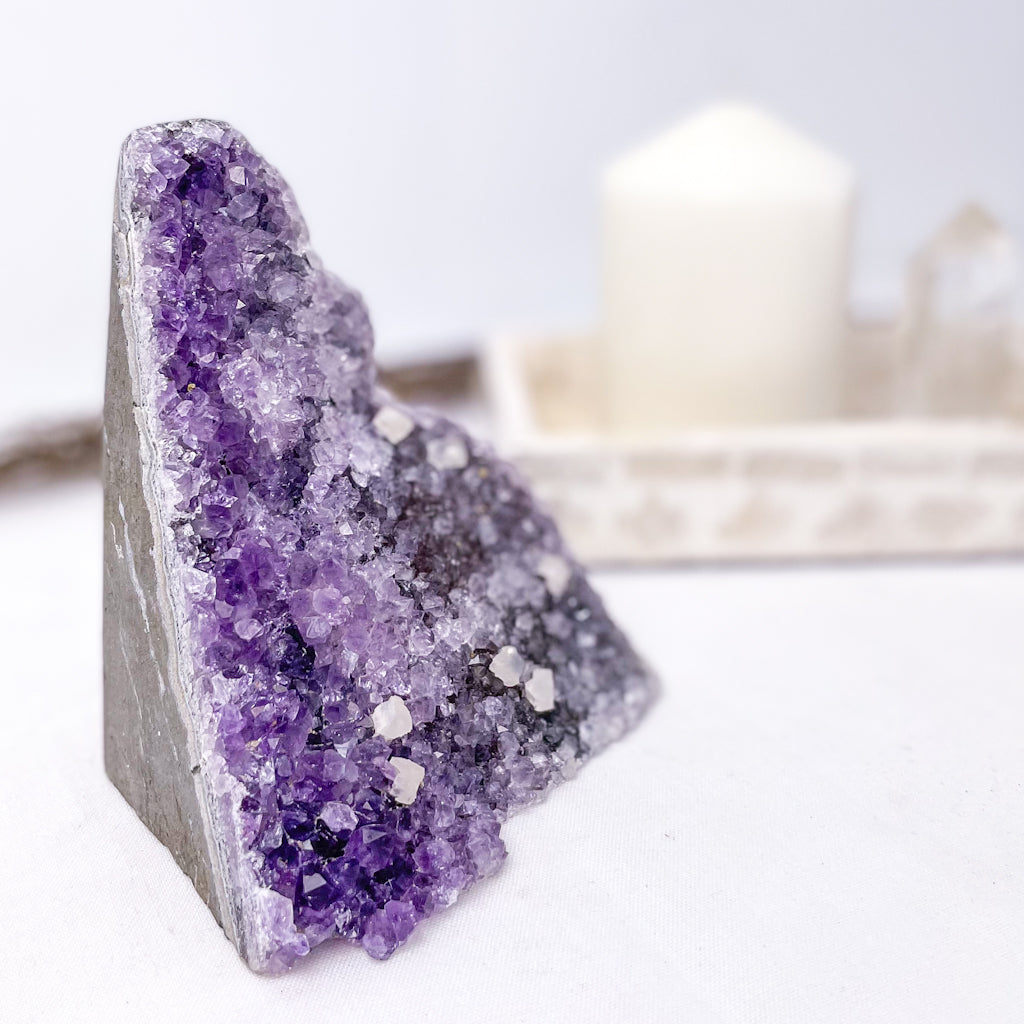 Amethyst + Calcite crystal flat base cluster