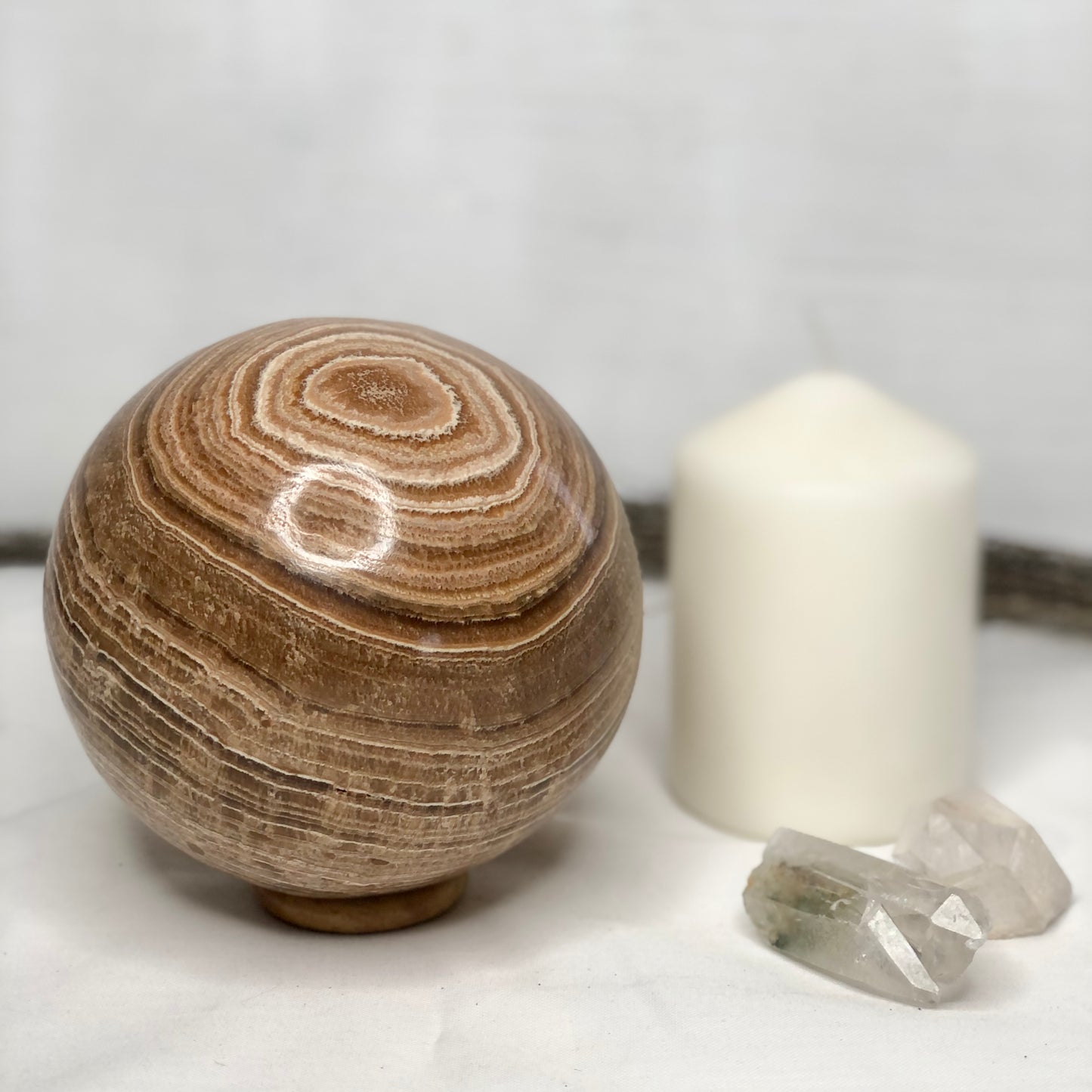 Aragonite crystal sphere with ring stand 2kg