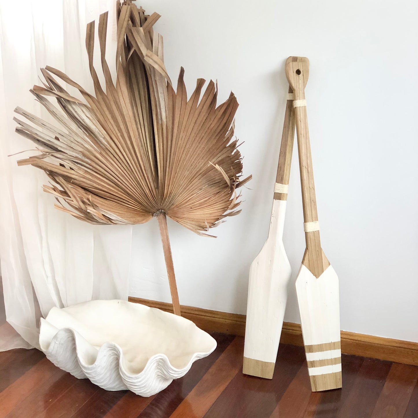 Sailing whitewashed boat oar wall decor