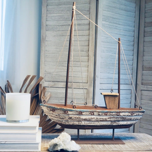 Sailing fishing boat statue