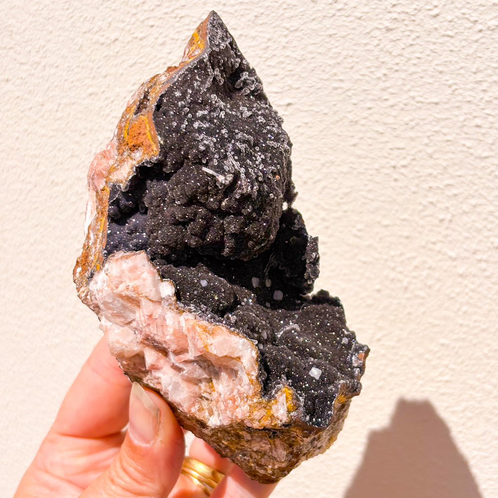 Manganese oxide, Rose quartz + Calcite crystal cluster on gold stand