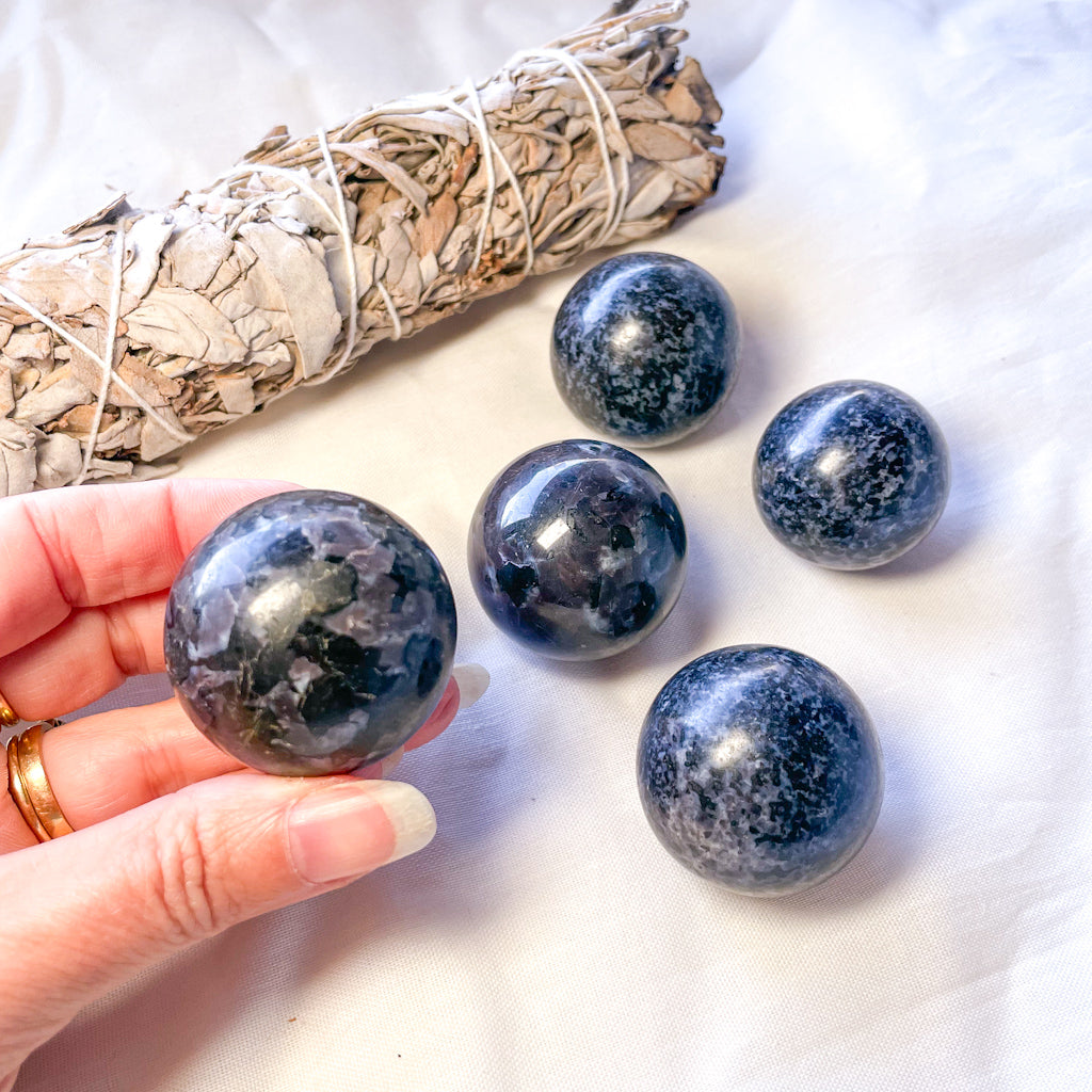 Indigo Gabbro crystal palm stone or sphere