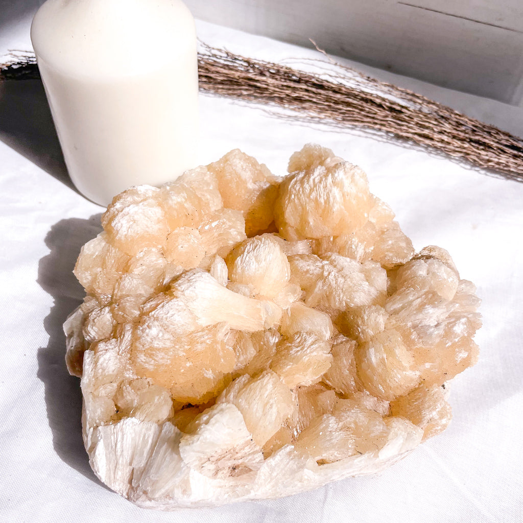 Peach stilbite crystal cluster