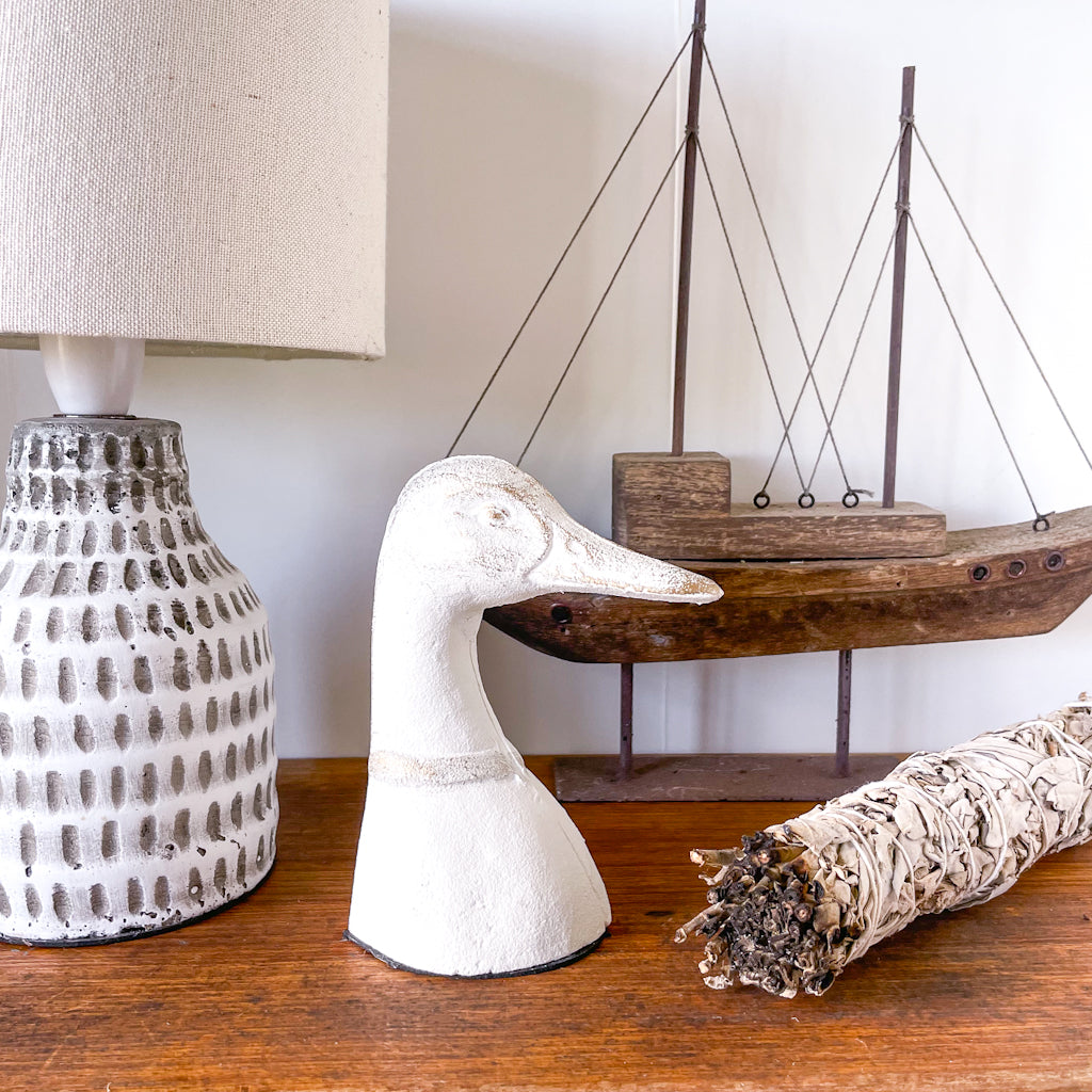 White washed iron duck bookend
