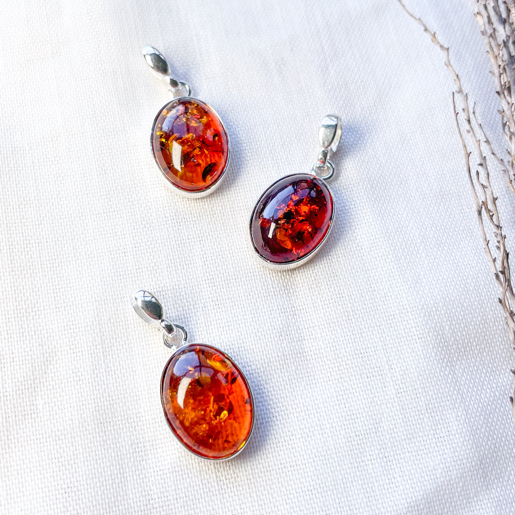 Baltic Amber sterling silver pendant with inclusions