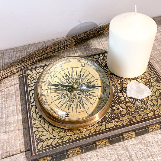 Antique brass compass paperweight