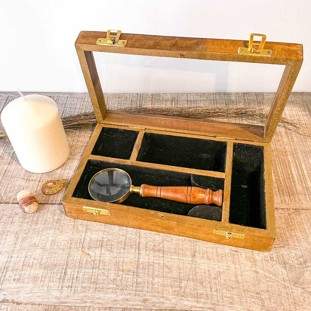 Wooden desk display box with antique brass magnifying glass