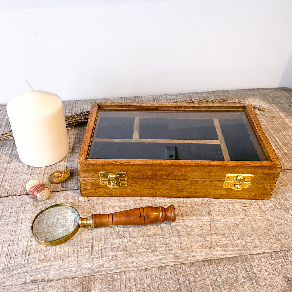 Wooden desk display box with antique brass magnifying glass