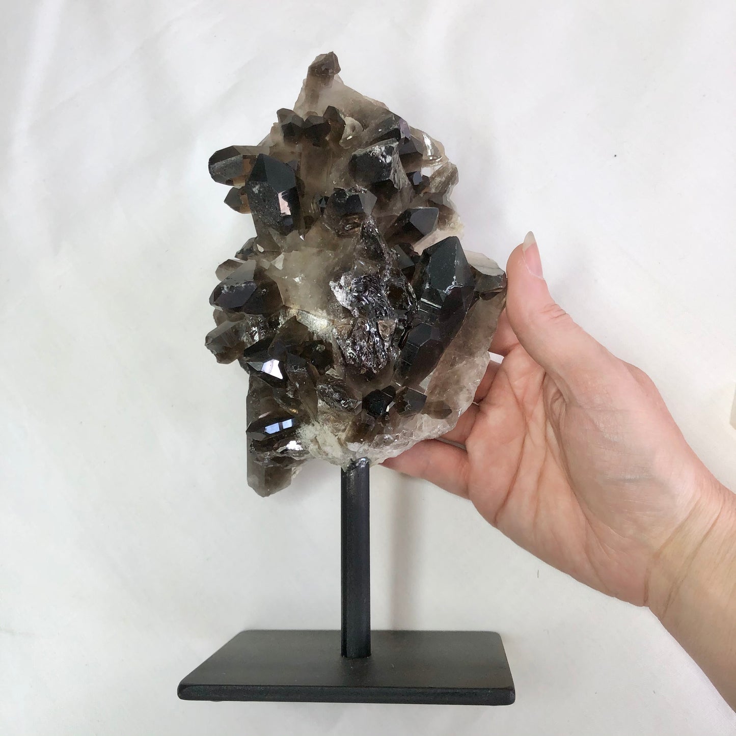 Smoky quartz crystal cluster on metal stand L 23cm