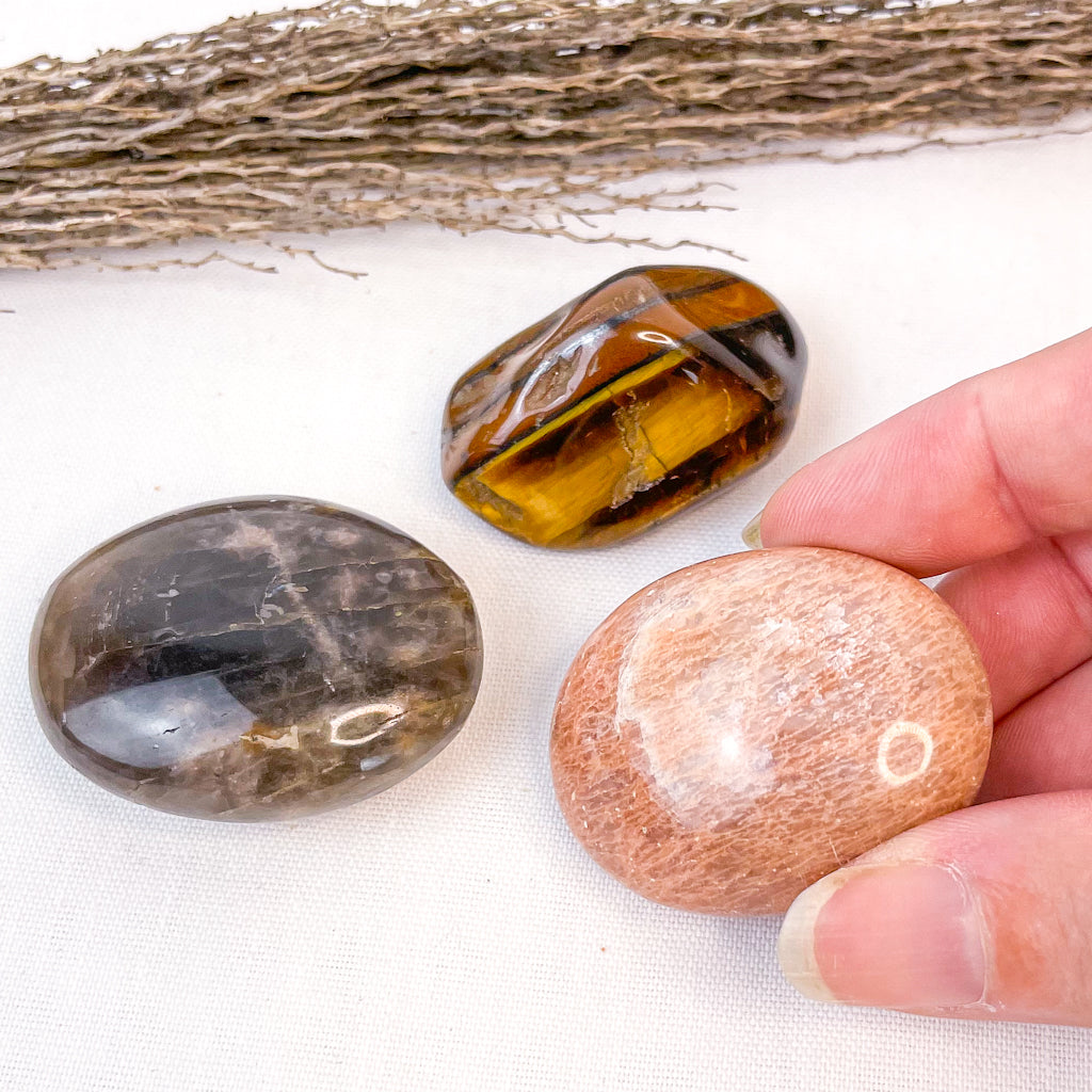 Trio of crystals - Black + Peach Moonstone palm stones + Tigers eye large tumble