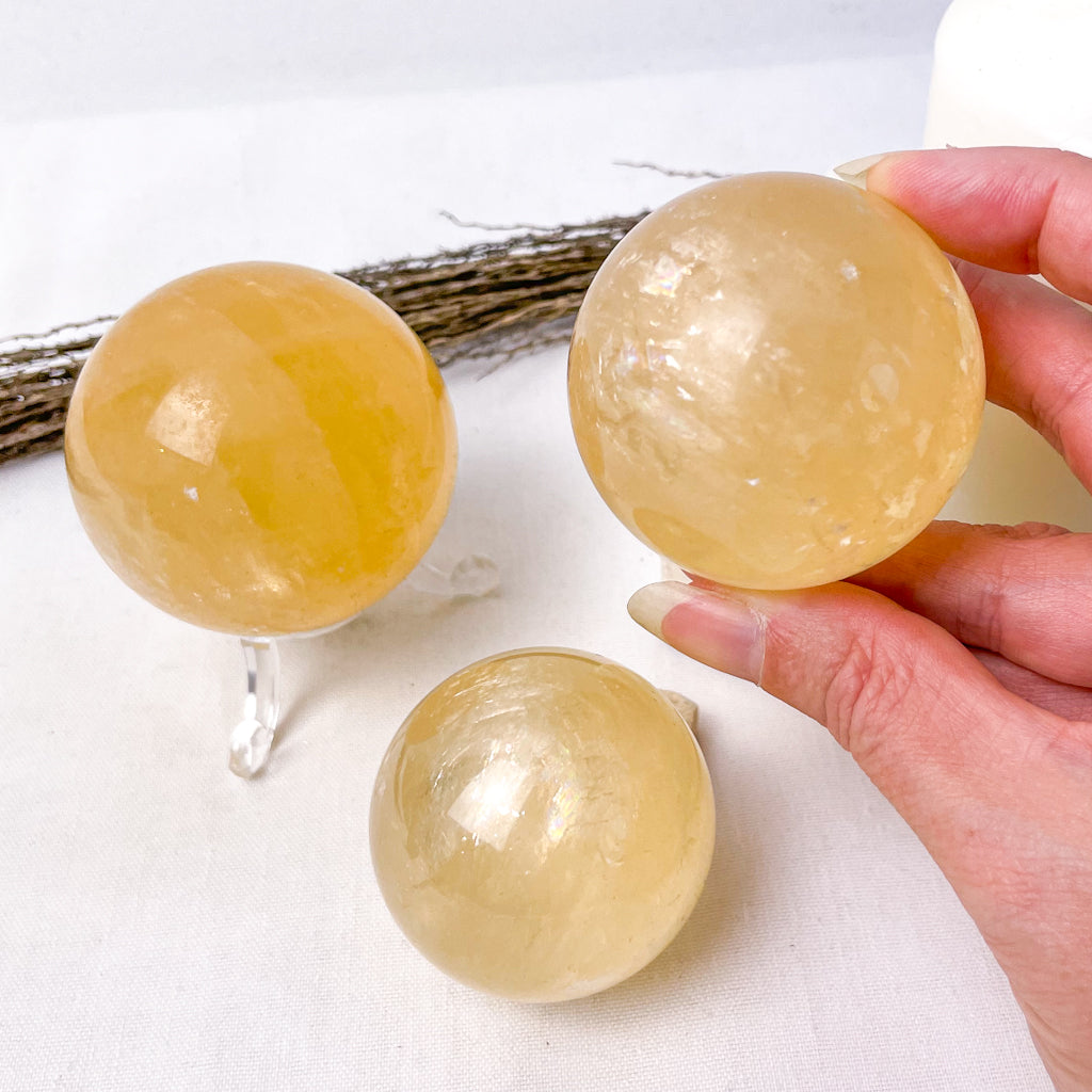 Calcite honey crystal sphere