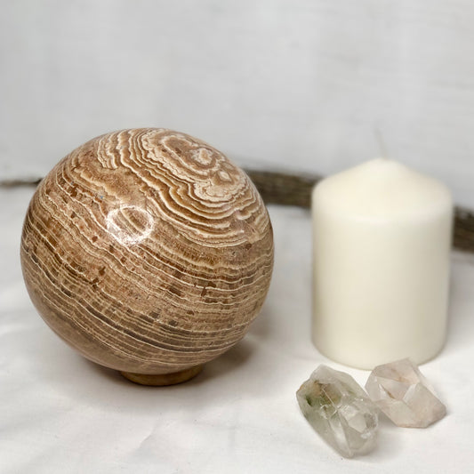 Aragonite crystal sphere with ring stand 2kg