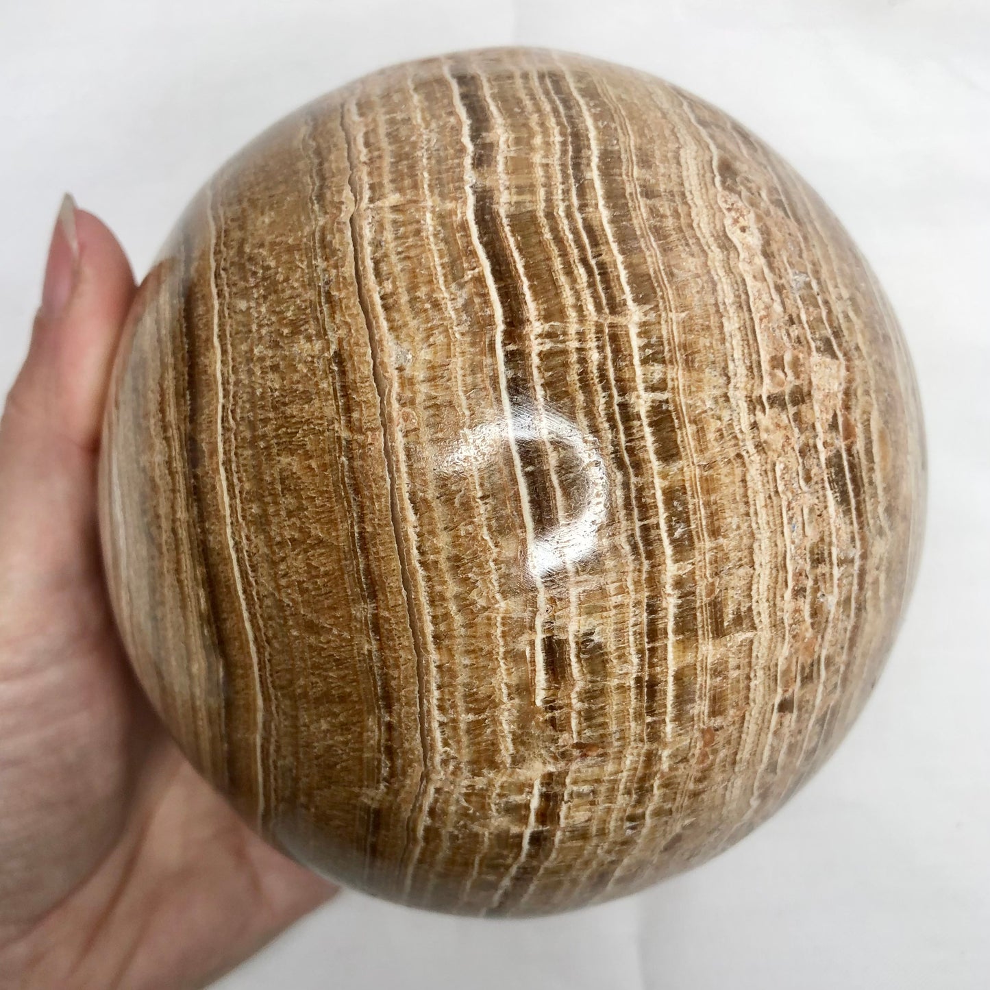 Aragonite crystal sphere with ring stand 2kg
