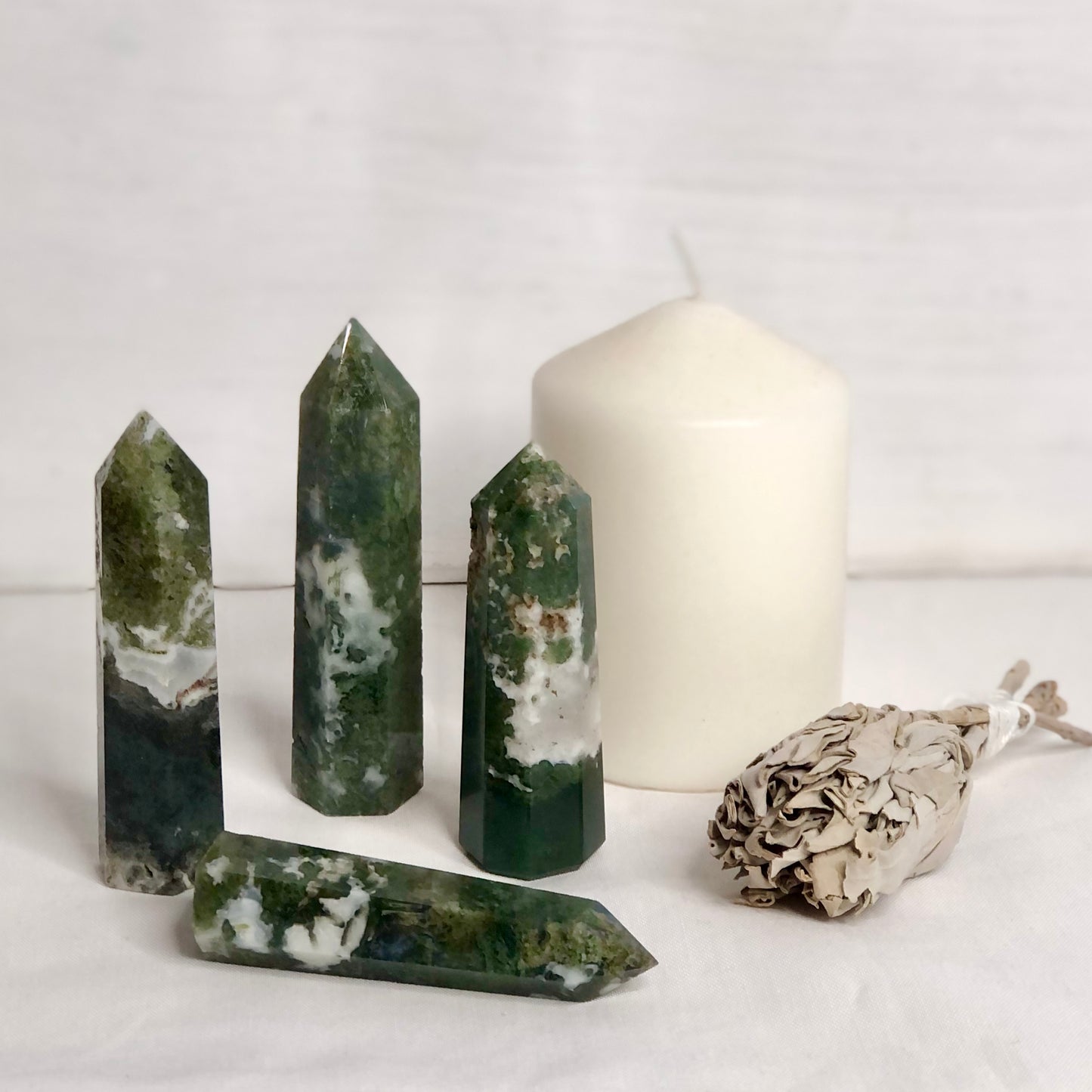 Moss agate crystal point generator tower