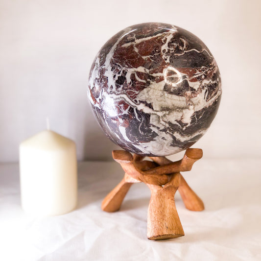 Onyx red crystal sphere with wooden  tripod XL