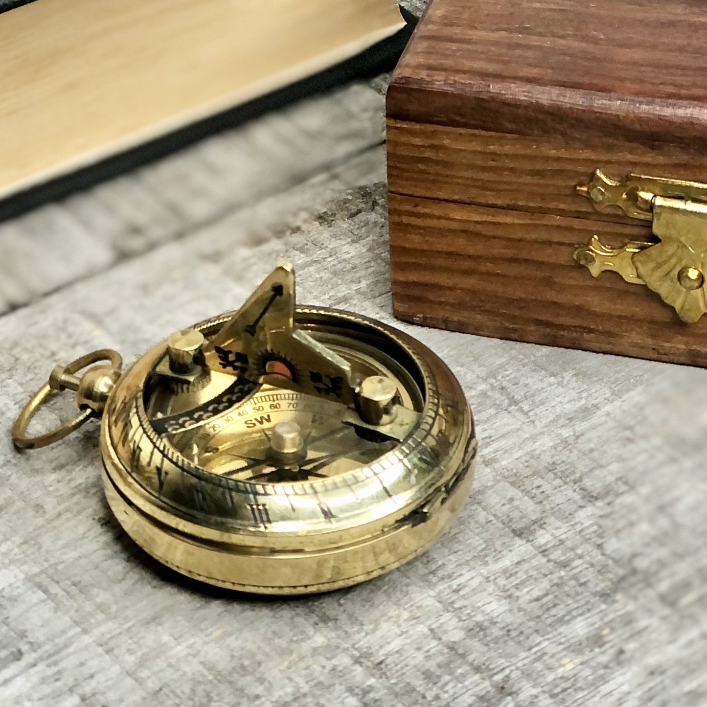 Antique brass compass, sundial and wooden box