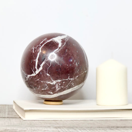 Onyx red crystal sphere on wooden stand XL