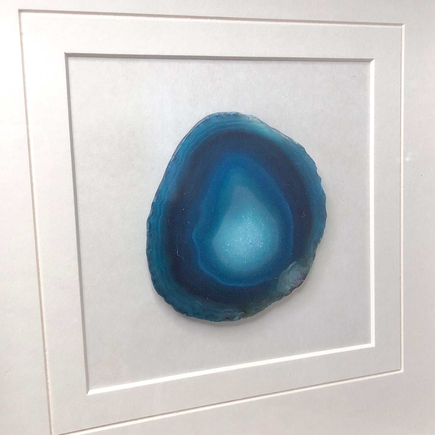 Coloured Agate crystal framed blue