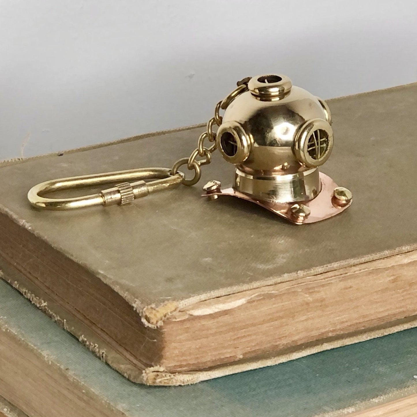 Antique divers helmet brass key chain